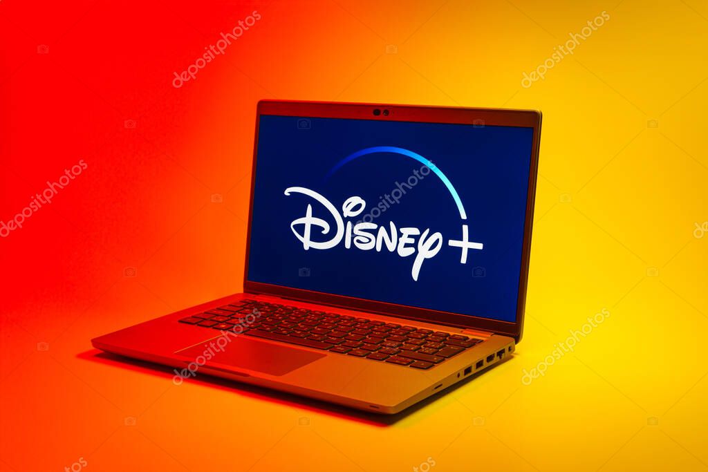 Prague, Czechia - 02 21 2025: Laptop on surface showing Disney + logo.