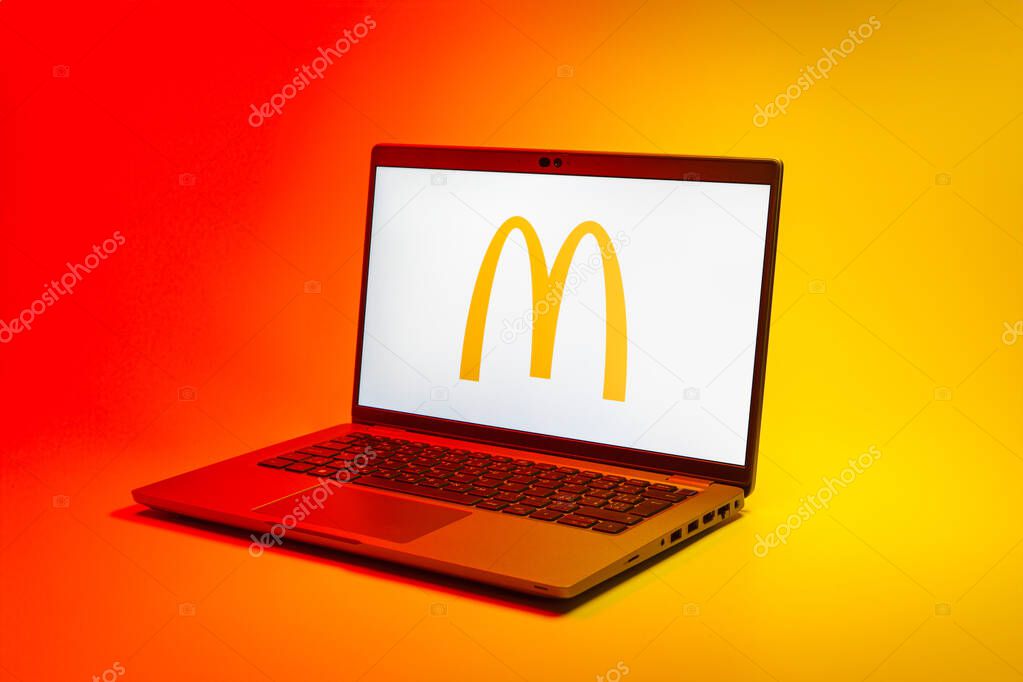 Prague, Czechia - 02 21 2025: Laptop on surface showing McDonalds logo.