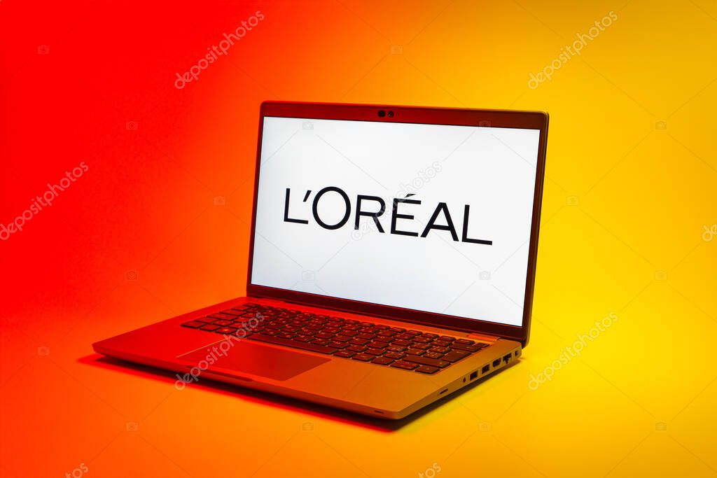 Prague, Czechia - 02 21 2025: Laptop on surface showing L'Oreal logo.