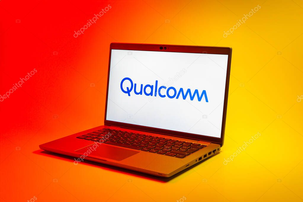 Prague, Czechia - 02 21 2025: Laptop on surface showing Qualcomm logo.