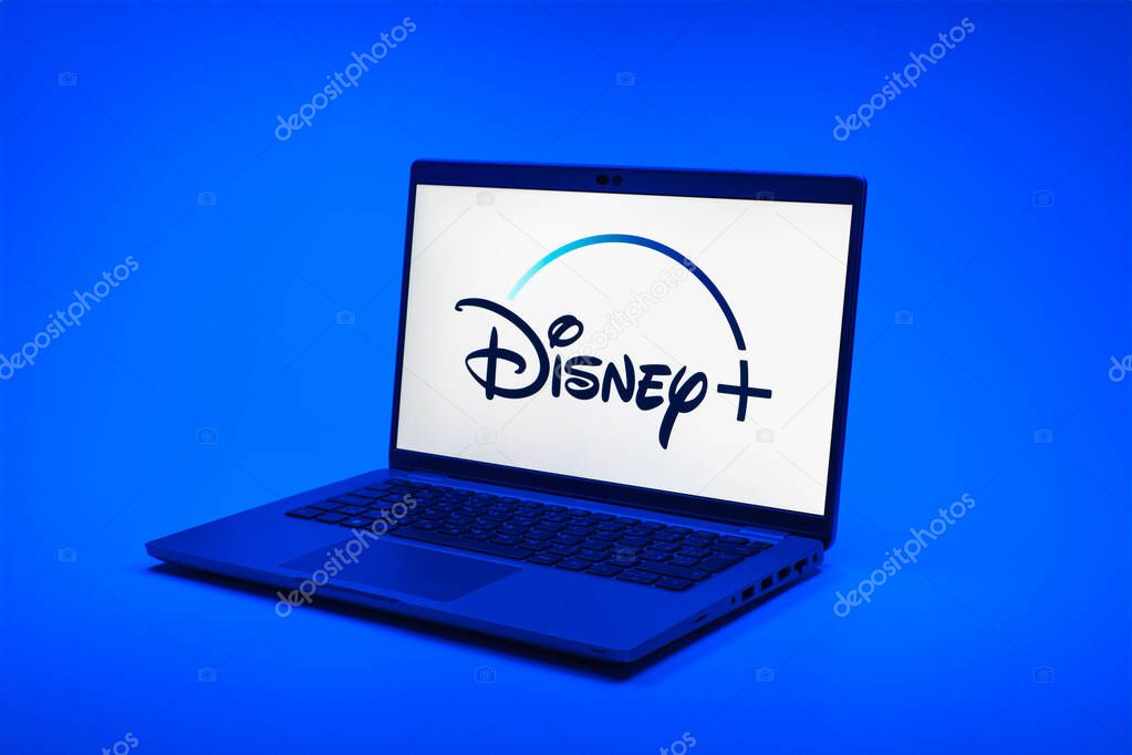 Prague, Czechia - 02 21 2025: Laptop on surface showing Disney + logo.