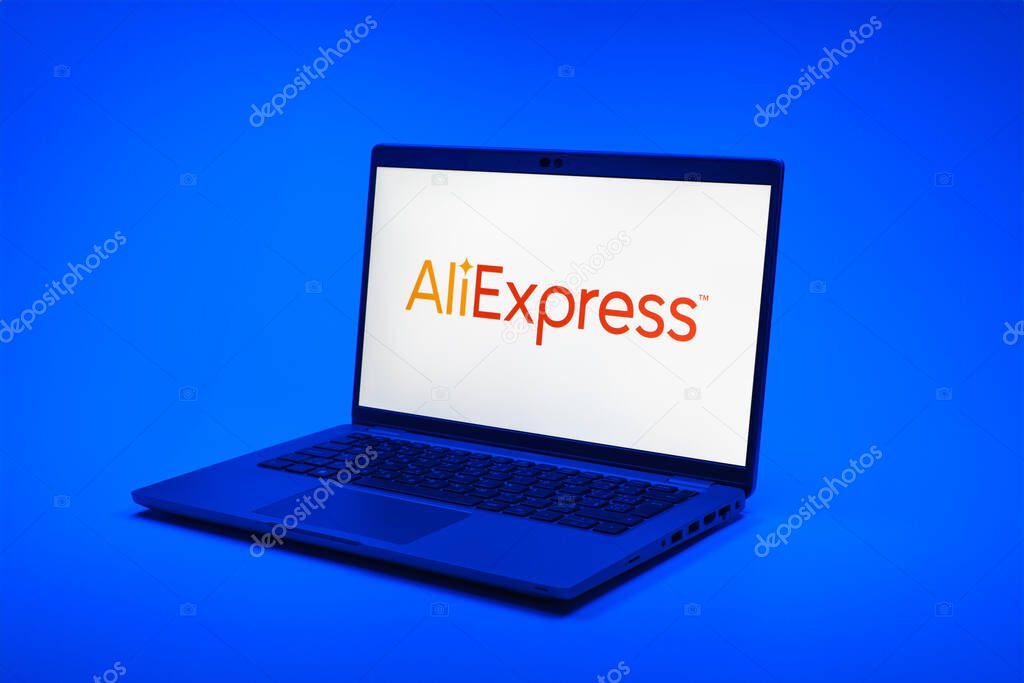 Prague, Czechia - 02 21 2025: Laptop on surface showing AliExpress logo.