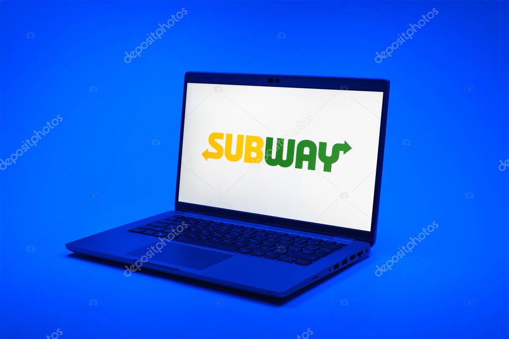 Prague, Czechia - 02 21 2025: Laptop on surface showing Subway logo.