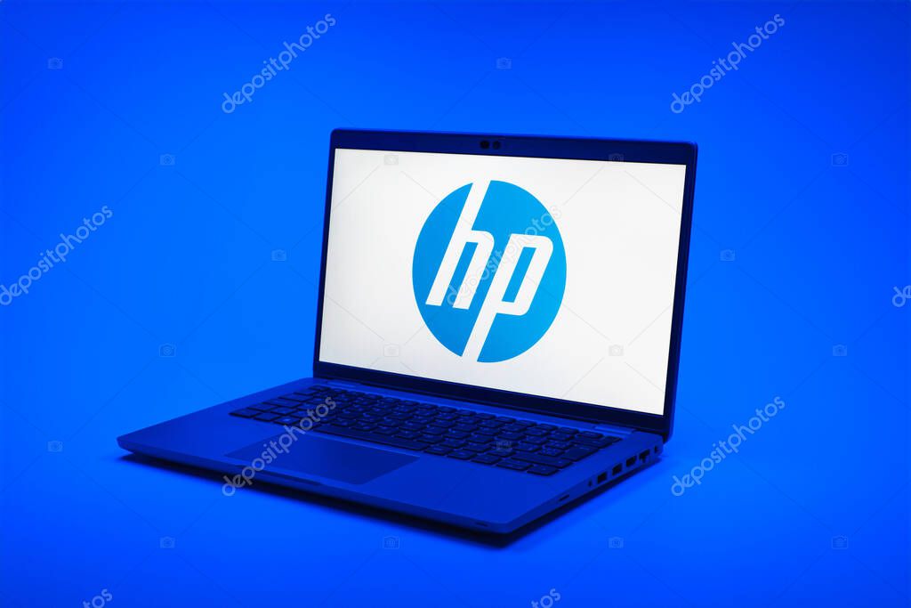 Prague, Czechia - 02 21 2025: Laptop on surface showing Hewlett-Packard logo.