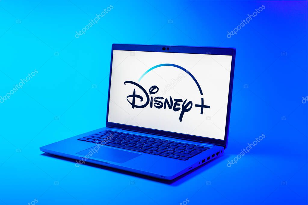 Prague, Czechia - 02 21 2025: Laptop on surface showing Disney + logo.