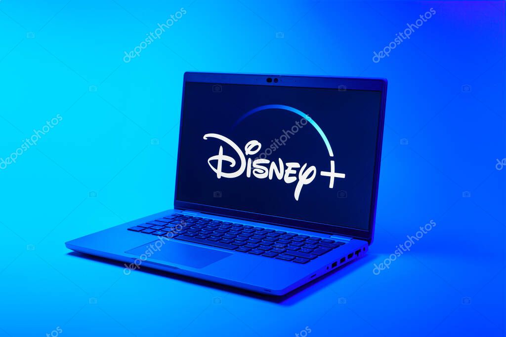Prague, Czechia - 02 21 2025: Laptop on surface showing Disney + logo.