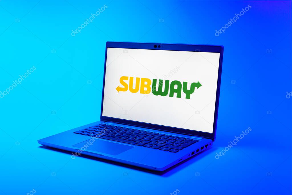 Prague, Czechia - 02 21 2025: Laptop on surface showing Subway logo.