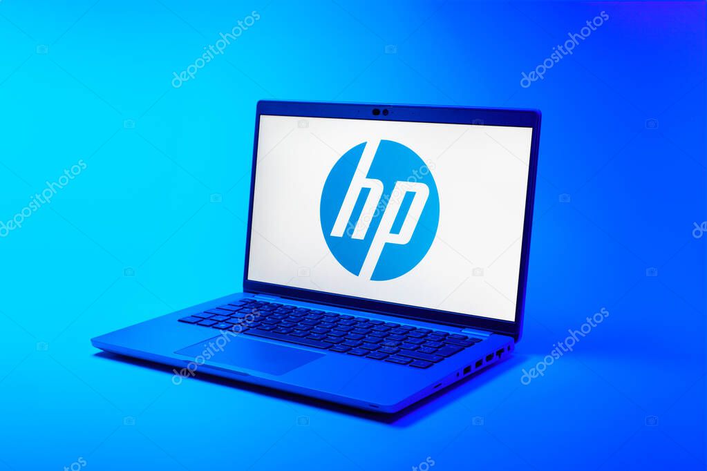 Prague, Czechia - 02 21 2025: Laptop on surface showing Hewlett-Packard logo.