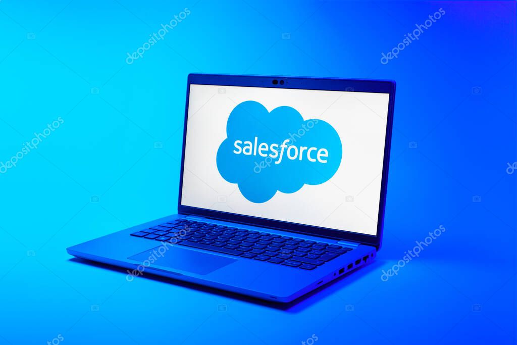 Prague, Czechia - 02 21 2025: Laptop on surface showing Salesforce logo.