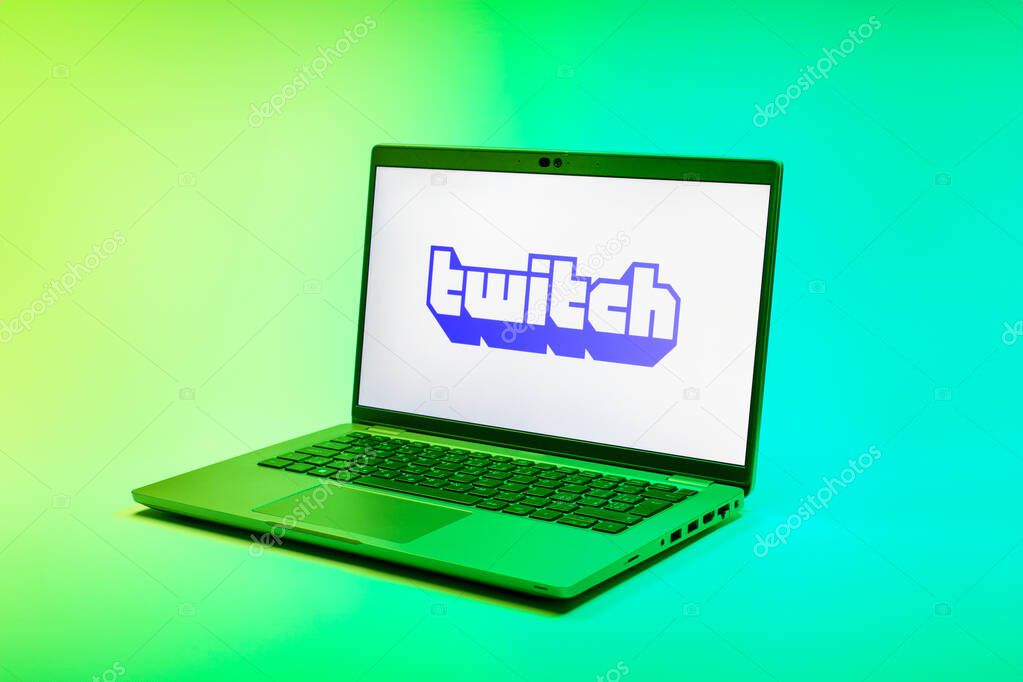 Prague, Czechia - 02 21 2025: Laptop on surface showing Twitch logo.