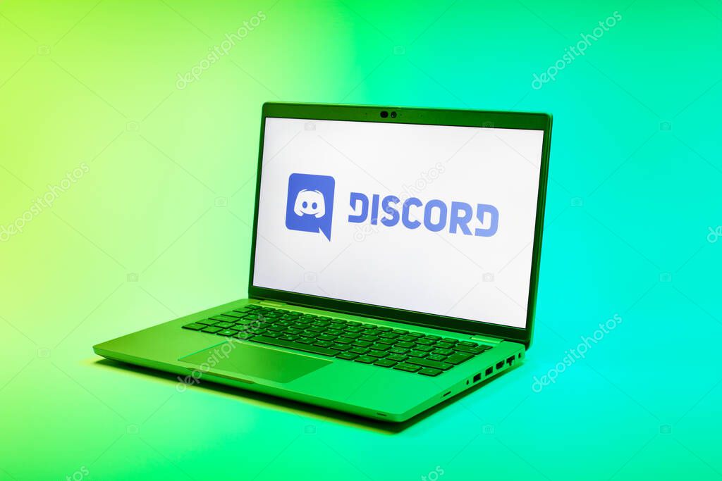 Prague, Czechia - 02 21 2025: Laptop on surface showing Discord logo.