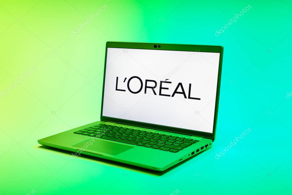 Prague, Czechia - 02 21 2025: Laptop on surface showing L'Oreal logo.