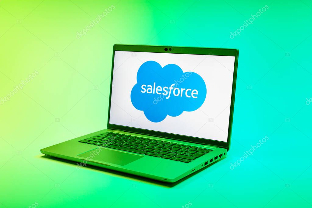 Prague, Czechia - 02 21 2025: Laptop on surface showing Salesforce logo.