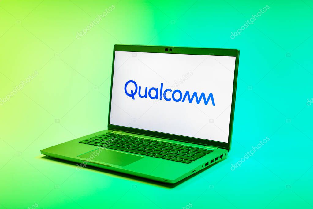 Prague, Czechia - 02 21 2025: Laptop on surface showing Qualcomm logo.