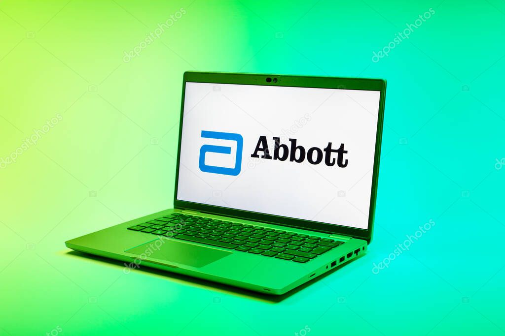 Prague, Czechia - 02 21 2025: Laptop on surface showing Abbott Laboratories logo.