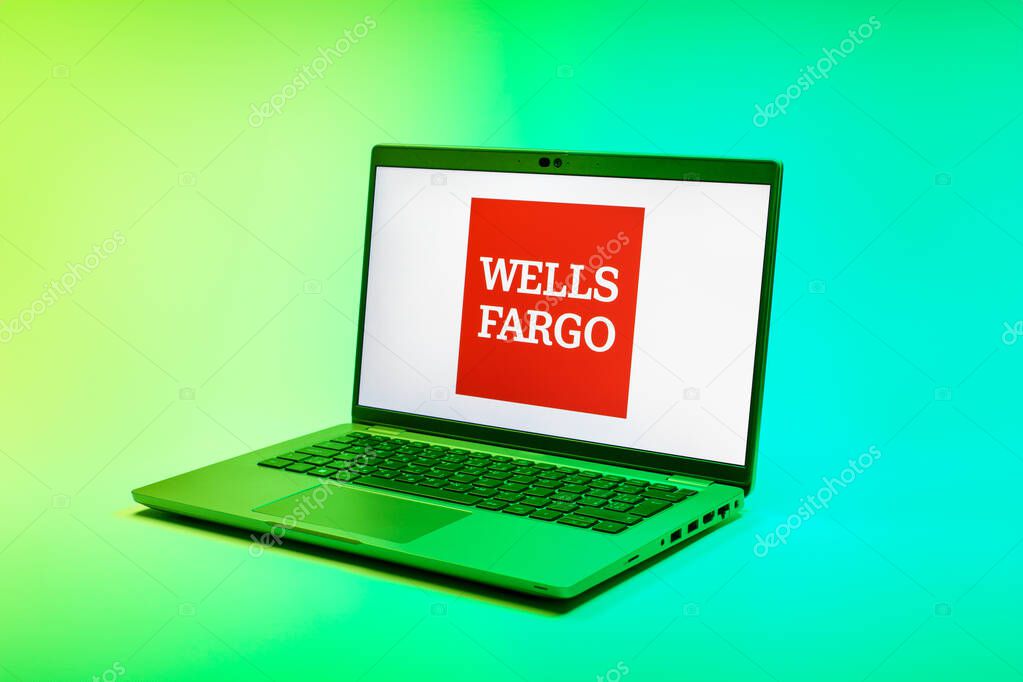 Prague, Czechia - 02 21 2025: Laptop on surface showing Wells Fargo logo.