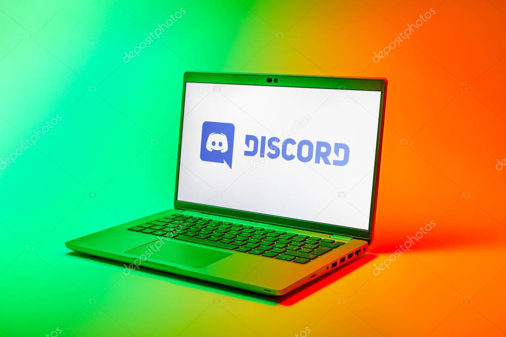 Prague, Czechia - 02 21 2025: Laptop on surface showing Discord logo.