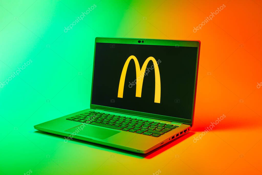Prague, Czechia - 02 21 2025: Laptop on surface showing McDonalds logo.