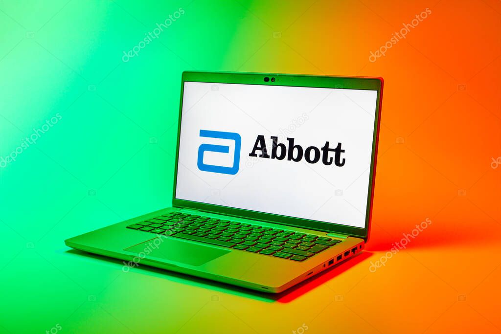 Prague, Czechia - 02 21 2025: Laptop on surface showing Abbott Laboratories logo.