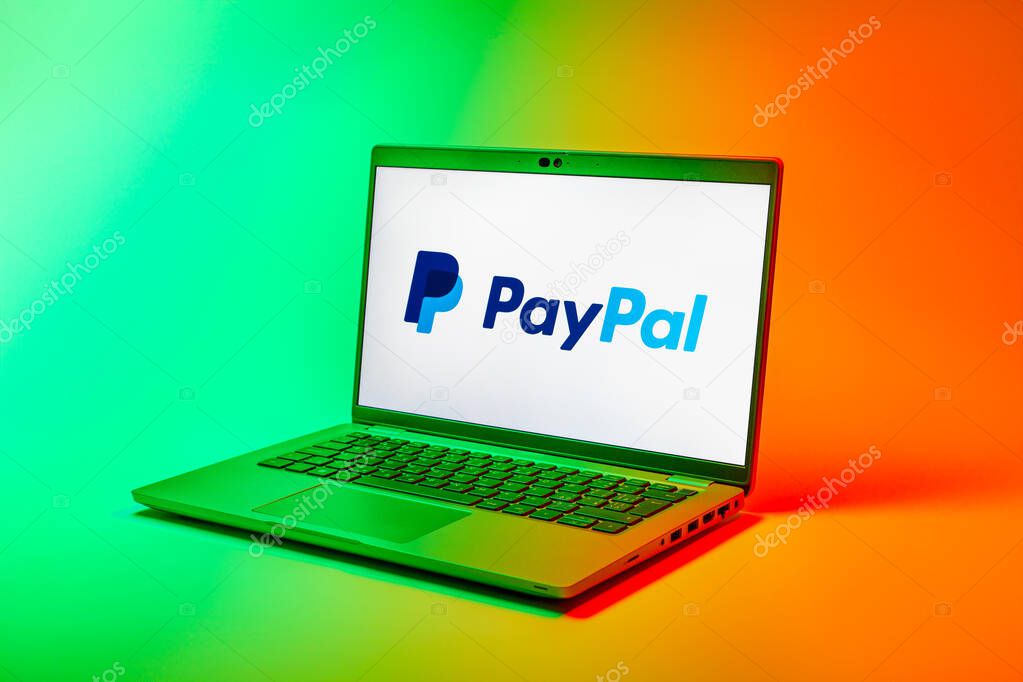Prague, Czechia - 02 21 2025: Laptop on surface showing PayPal logo.