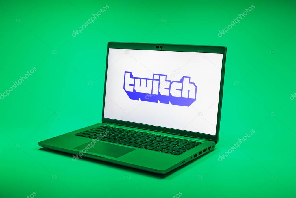 Prague, Czechia - 02 21 2025: Laptop on surface showing Twitch logo.