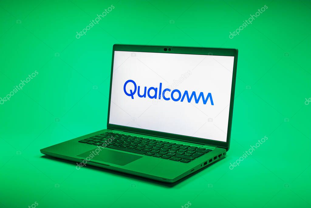 Prague, Czechia - 02 21 2025: Laptop on surface showing Qualcomm logo.
