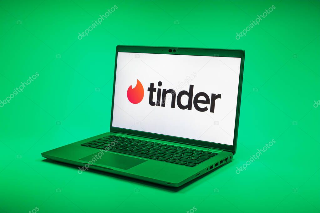 Prague, Czechia - 02 21 2025: Laptop on surface showing Tinder logo.