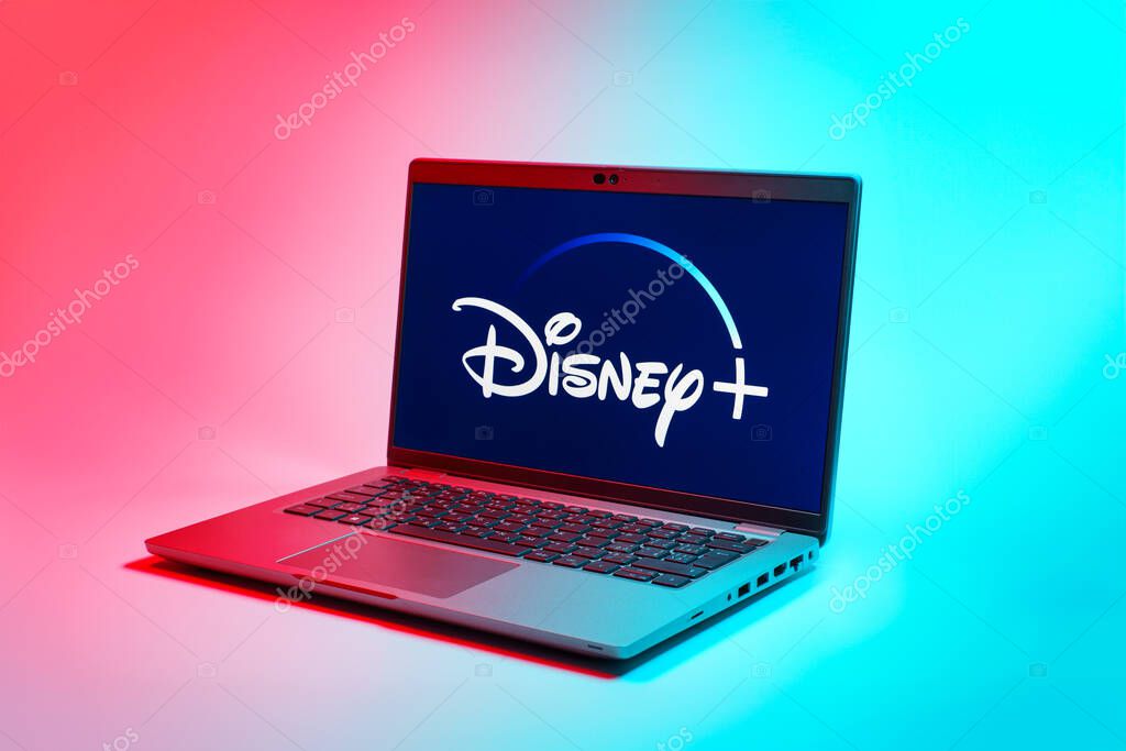 Prague, Czechia - 02 21 2025: Laptop on surface showing Disney + logo.