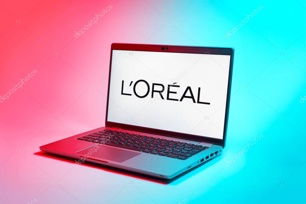 Prague, Czechia - 02 21 2025: Laptop on surface showing L'Oreal logo.