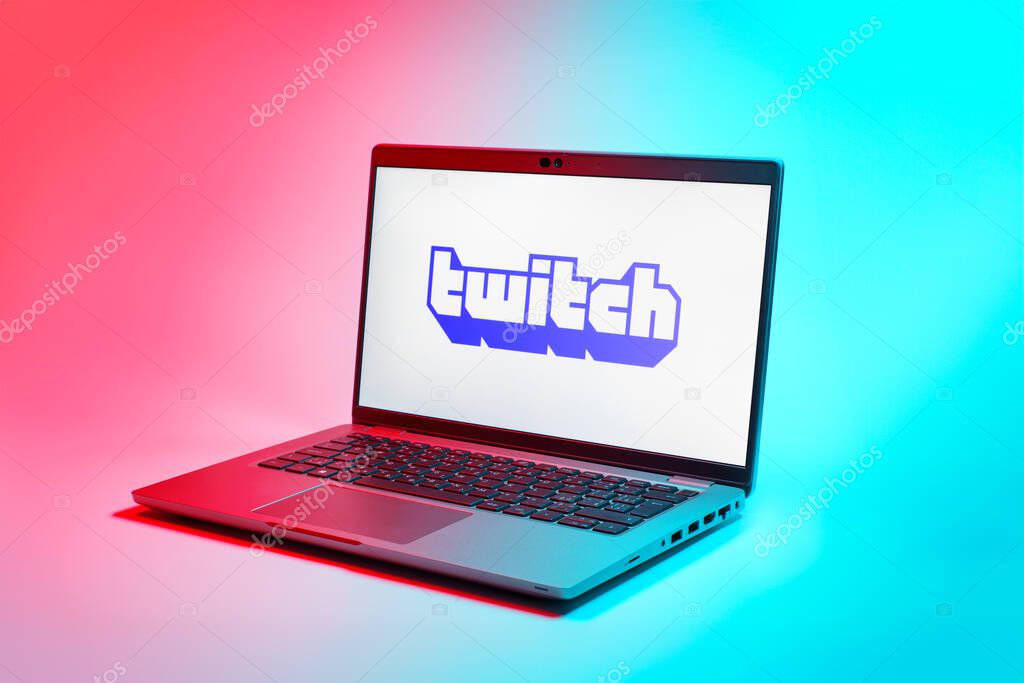 Prague, Czechia - 02 21 2025: Laptop on surface showing Twitch logo.