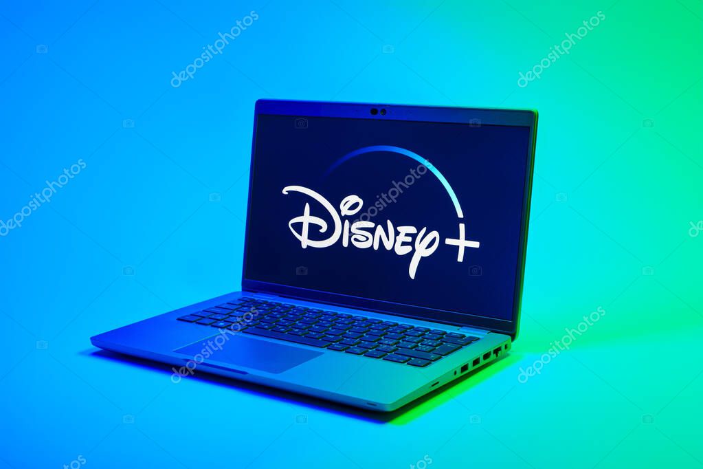 Prague, Czechia - 02 21 2025: Laptop on surface showing Disney + logo.