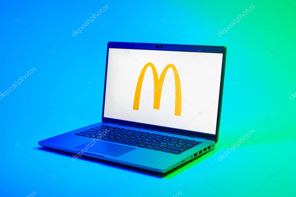 Prague, Czechia - 02 21 2025: Laptop on surface showing McDonalds logo.