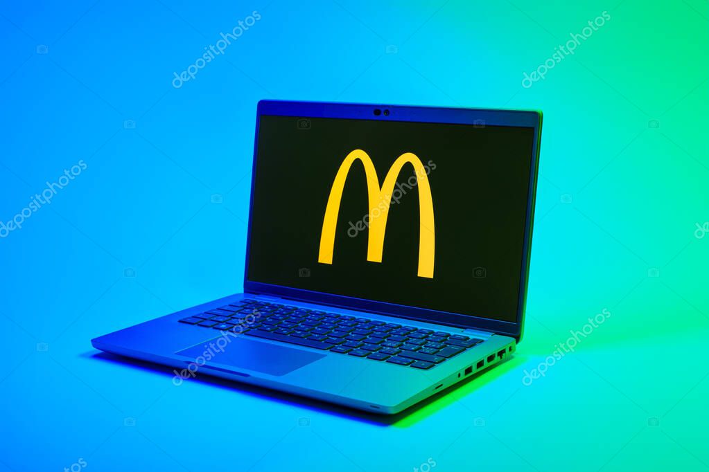Prague, Czechia - 02 21 2025: Laptop on surface showing McDonalds logo.