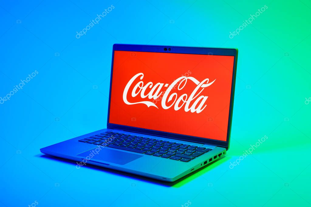 Prague, Czechia - 02 21 2025: Laptop on surface showing Coca-Cola logo.