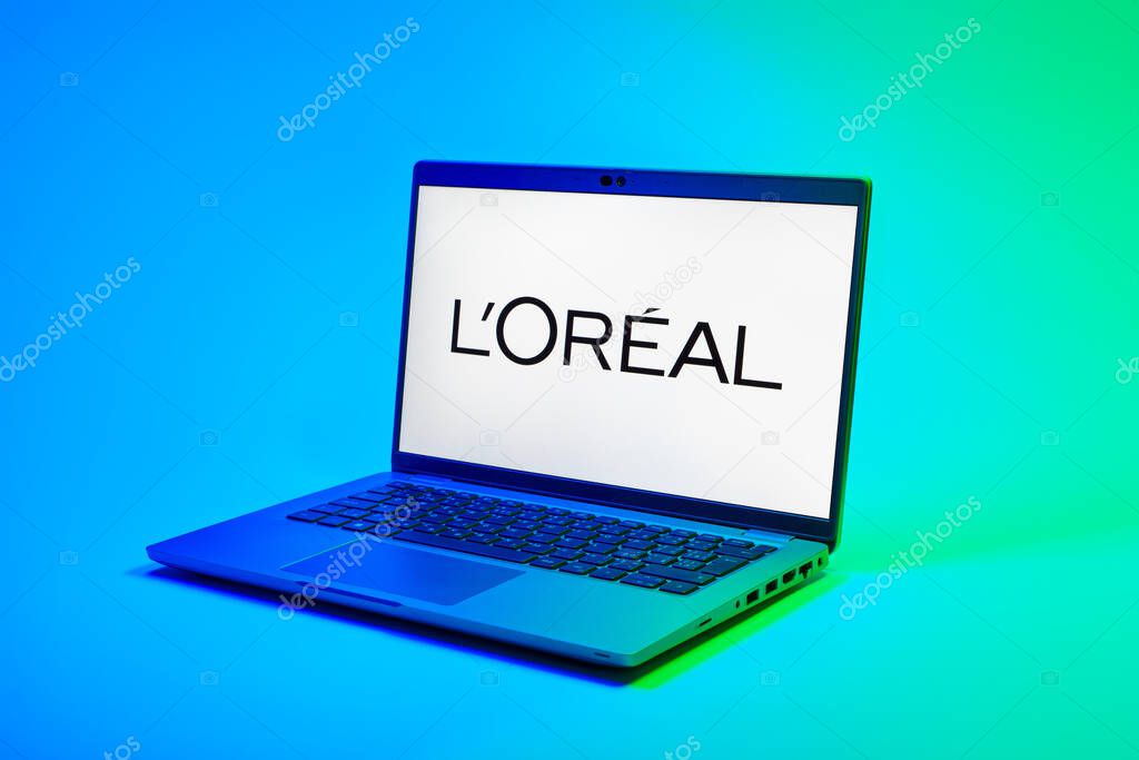 Prague, Czechia - 02 21 2025: Laptop on surface showing L'Oreal logo.
