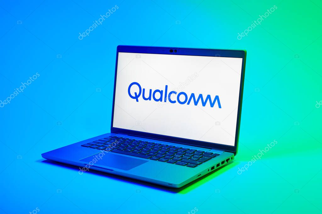 Prague, Czechia - 02 21 2025: Laptop on surface showing Qualcomm logo.