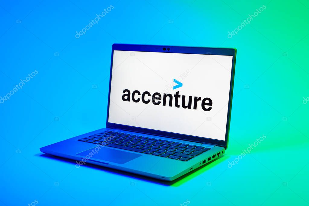 Prague, Czechia - 02 21 2025: Laptop on surface showing Accenture logo.