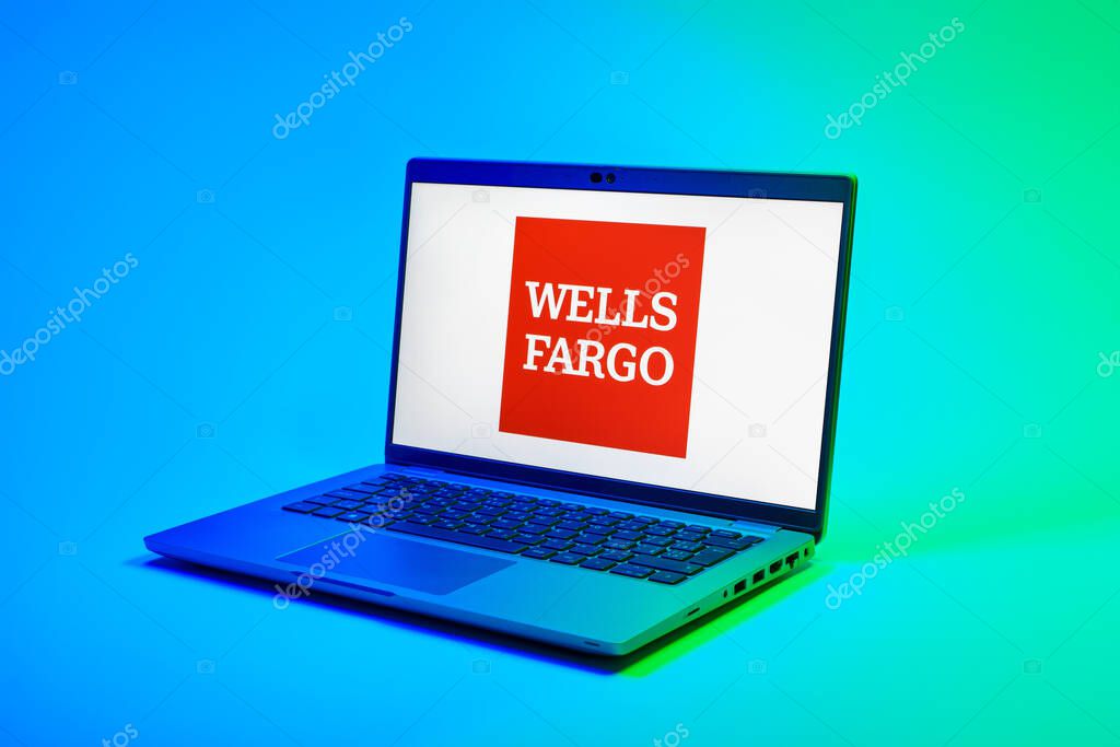 Prague, Czechia - 02 21 2025: Laptop on surface showing Wells Fargo logo.