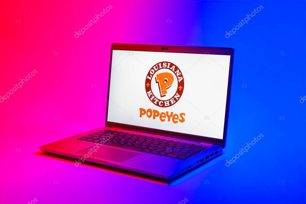 Prague, Czechia - 02 21 2025: Laptop on surface showing Popeyes logo.