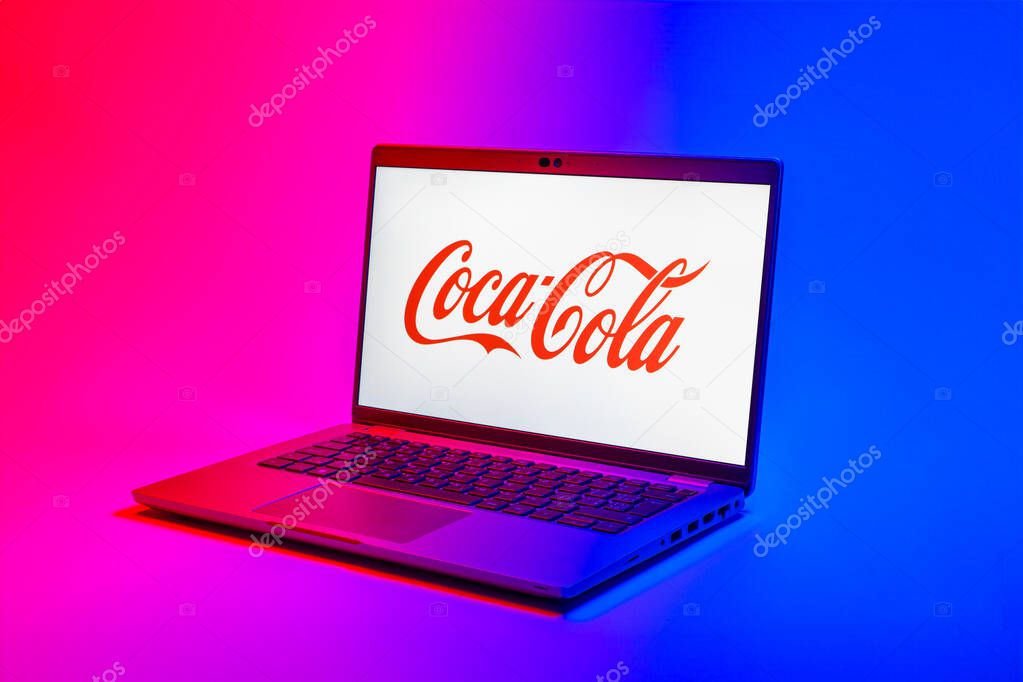 Prague, Czechia - 02 21 2025: Laptop on surface showing Coca-Cola logo.