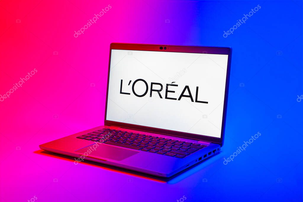 Prague, Czechia - 02 21 2025: Laptop on surface showing L'Oreal logo.