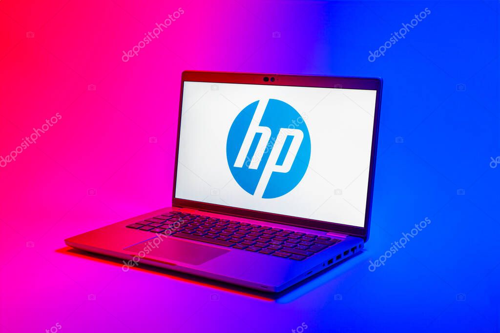 Prague, Czechia - 02 21 2025: Laptop on surface showing Hewlett-Packard logo.