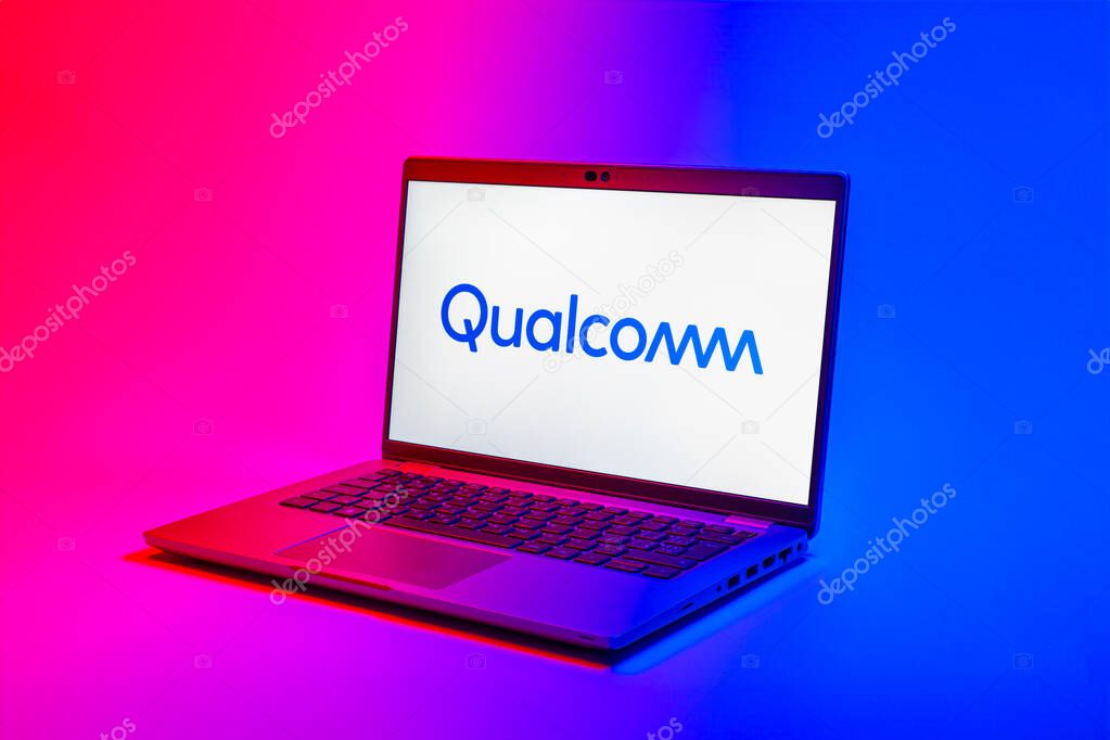 Prague, Czechia - 02 21 2025: Laptop on surface showing Qualcomm logo.