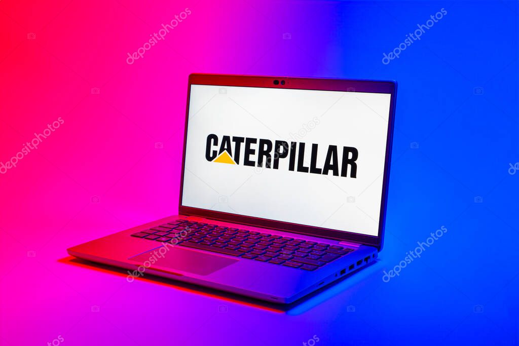 Prague, Czechia - 02 21 2025: Laptop on surface showing Caterpillar logo.