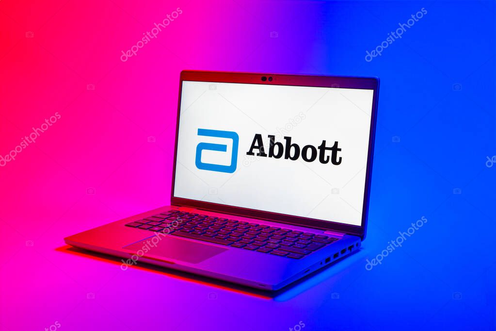 Prague, Czechia - 02 21 2025: Laptop on surface showing Abbott Laboratories logo.