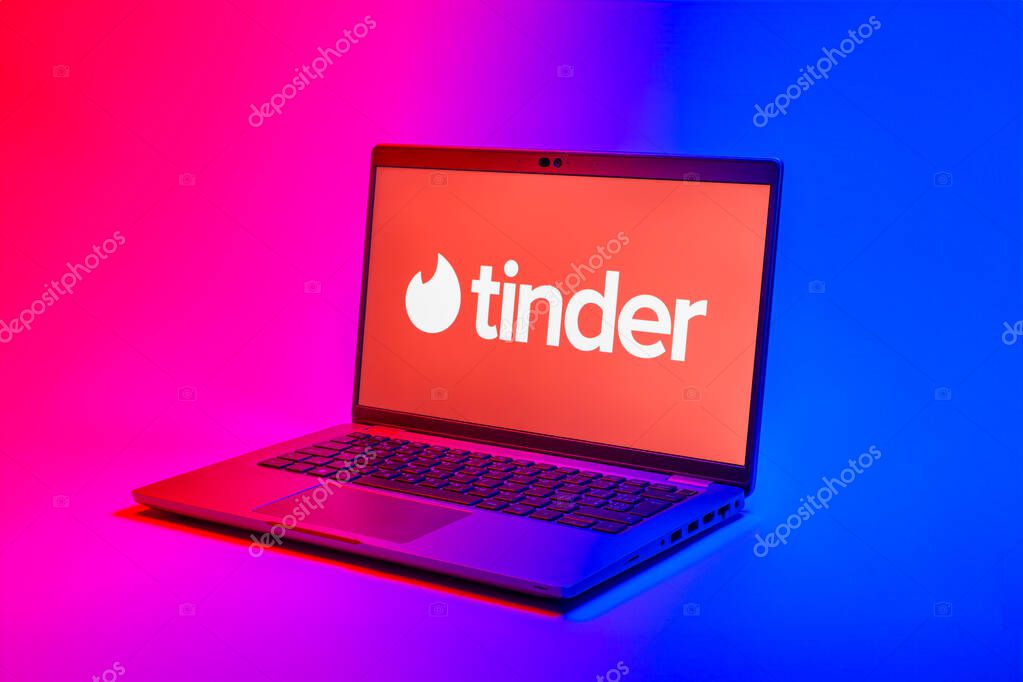 Prague, Czechia - 02 21 2025: Laptop on surface showing Tinder logo.