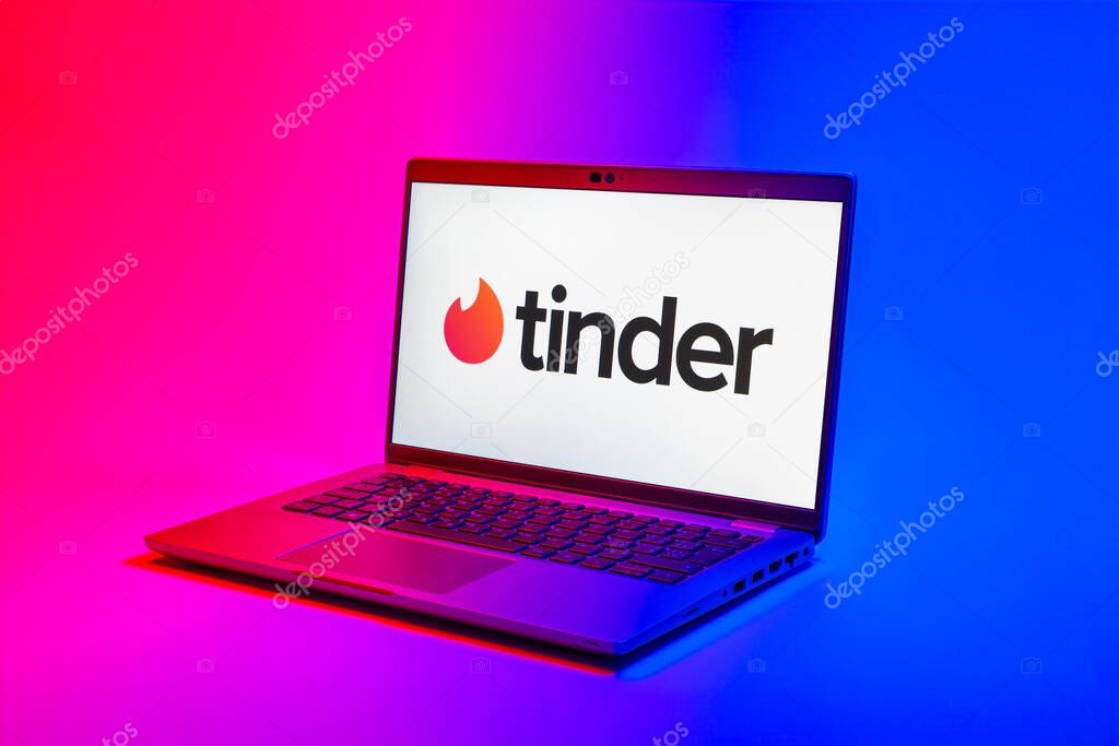Prague, Czechia - 02 21 2025: Laptop on surface showing Tinder logo.