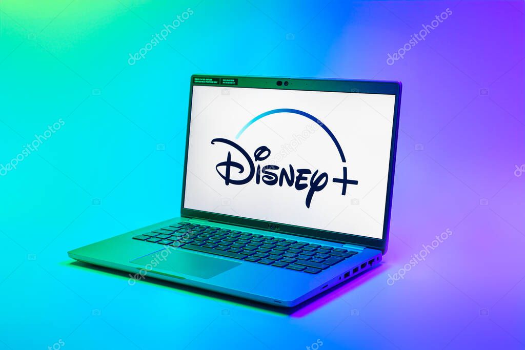 Prague, Czechia - 02 21 2025: Laptop on surface showing Disney + logo.
