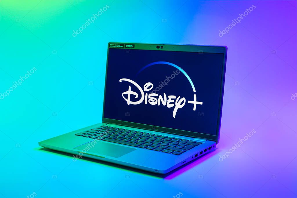 Prague, Czechia - 02 21 2025: Laptop on surface showing Disney + logo.