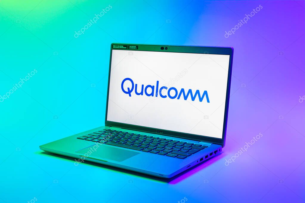 Prague, Czechia - 02 21 2025: Laptop on surface showing Qualcomm logo.
